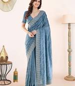 Blue embroidered festive wear saree with matching blouse