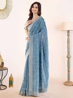 Blue embroidered festive wear saree with matching blouse 2