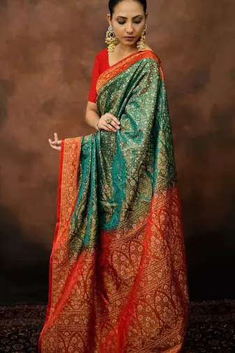 Rama green satin woven saree with blouse