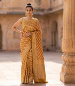 Mustard satin woven saree with blouse