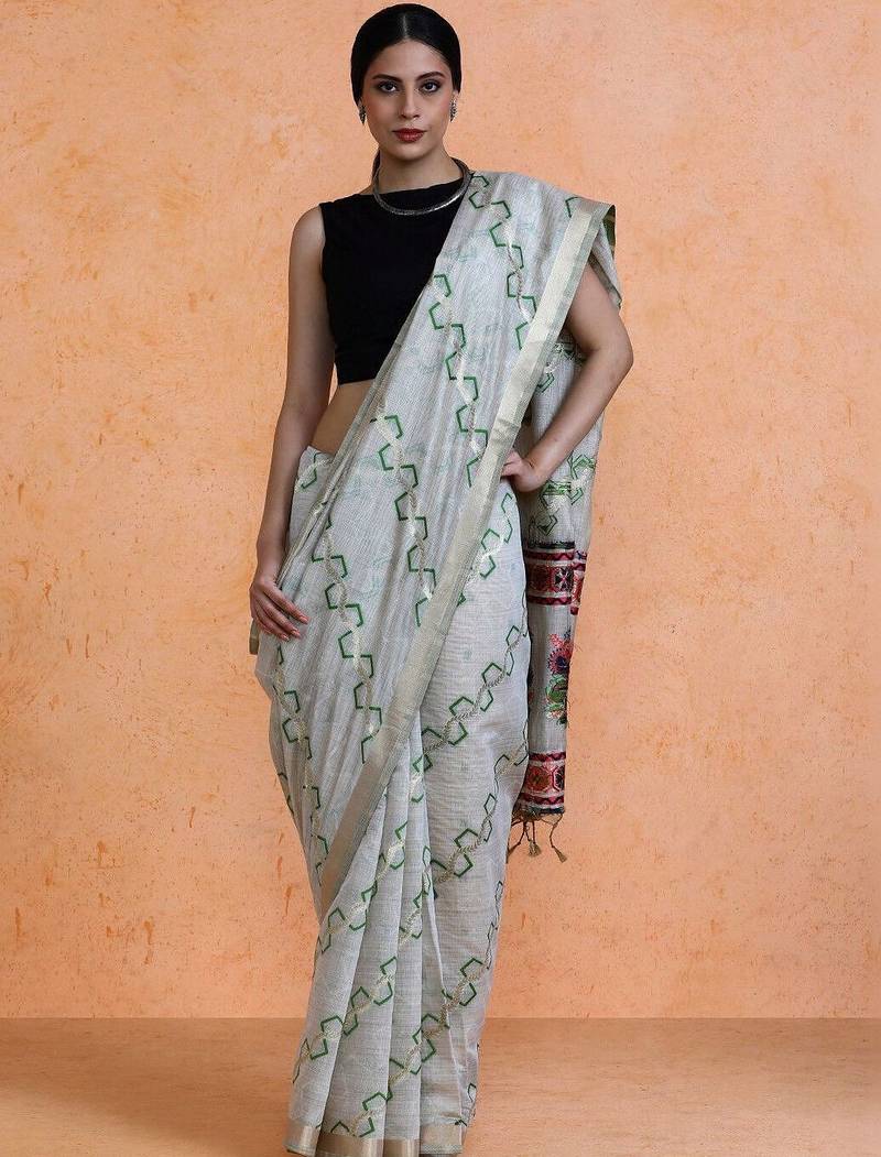 Grey woven design muga sarees with blouse piece