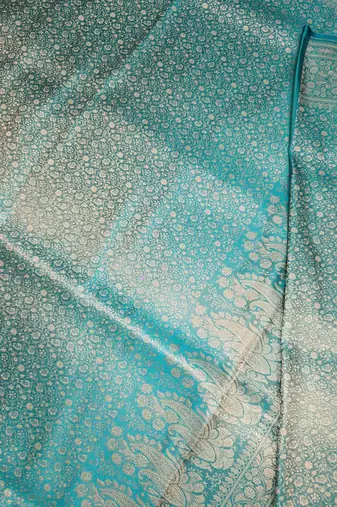 Sea green satin woven saree with blouse