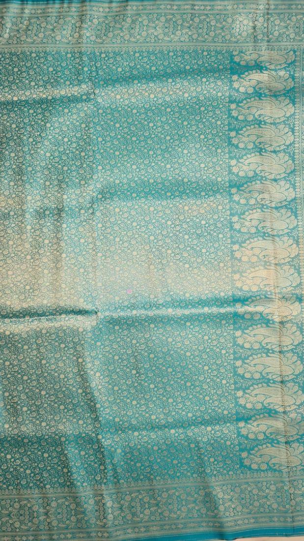 Sea green satin woven saree with blouse