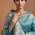 Sea green satin woven saree with blouse