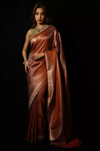 Rust satin woven saree with blouse