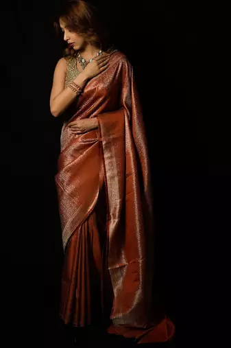 Rust satin woven saree with blouse
