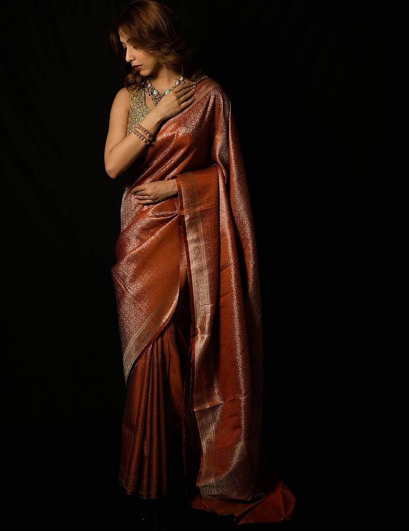 Rust satin woven saree with blouse