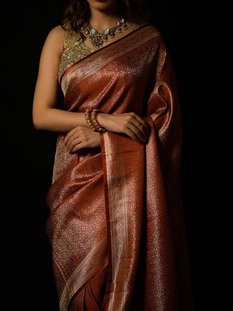 Rust satin woven saree with blouse