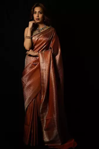 Rust satin woven saree with blouse