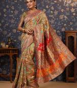 Lime embellished paisley woven design zari saree