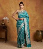 Teal blue katan silk woven saree with blouse