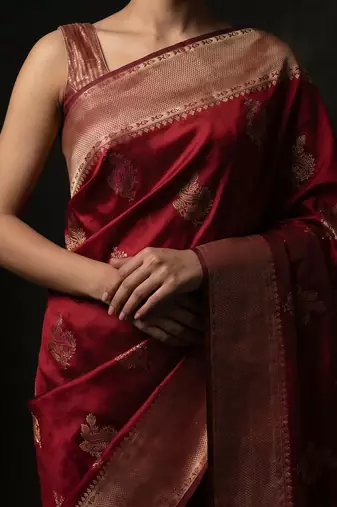 Red katan silk woven saree with blouse