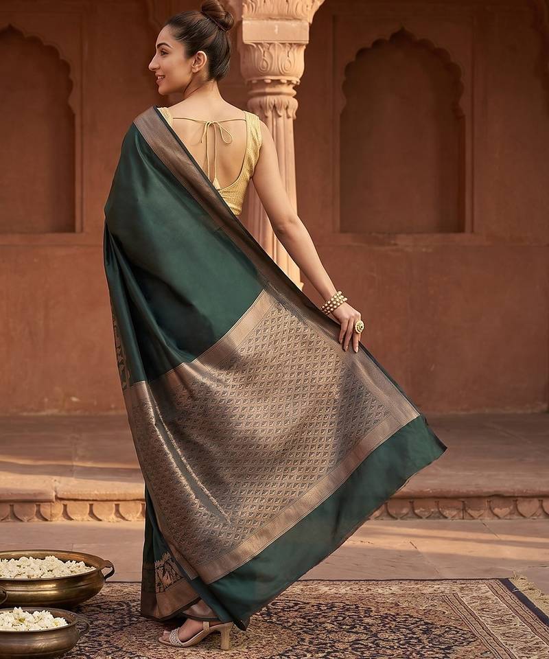 Bottle green katan silk woven saree with blouse