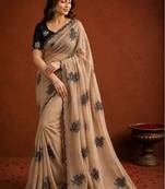 Beige ethnic motifs embroidered art silk saree