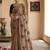 Beige ethnic motifs embroidered art silk saree