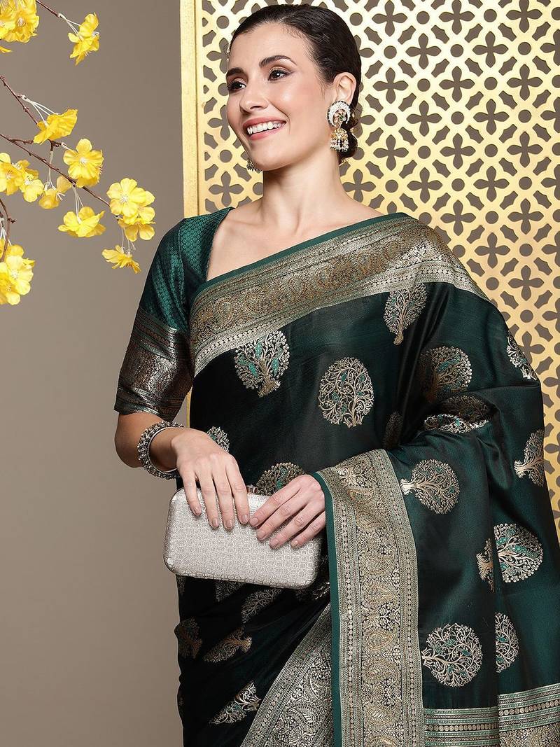 Green woven design ethnic motifs zari satin banarasi saree