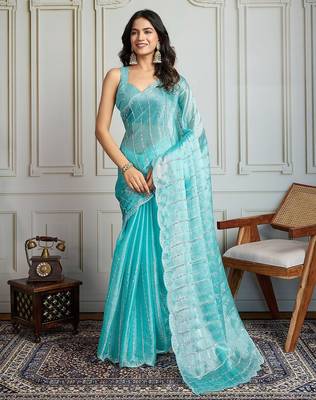 Turquoise embellished embroidered saree 2
