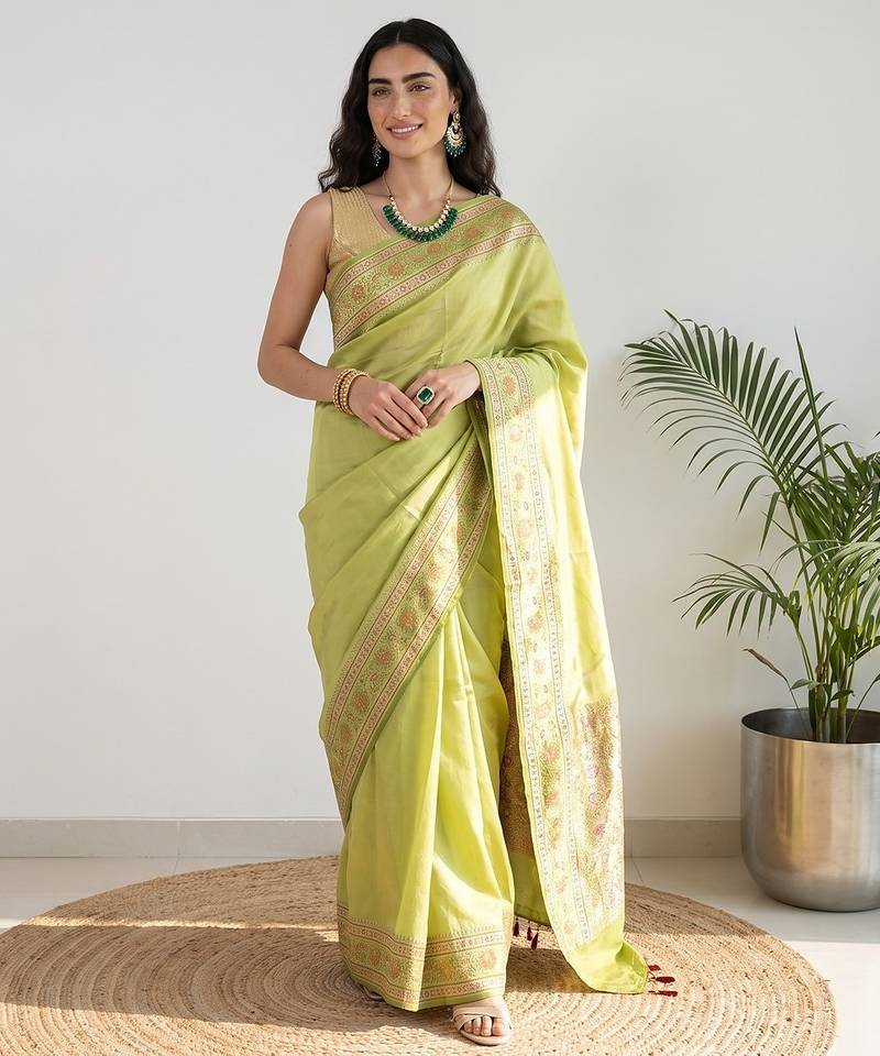 Pista green silk blend woven saree with blouse