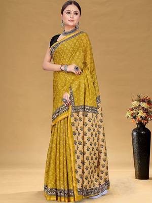 Yellow printed sarees & blouse piece 1