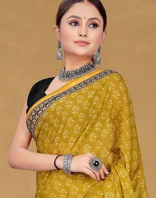 Yellow printed sarees & blouse piece 2