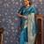 Turquoise ethnic motifs woven design zari banarasi saree