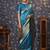 Turquoise ethnic motifs woven design zari banarasi saree