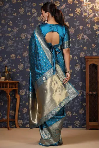 Turquoise ethnic motifs woven design zari banarasi saree