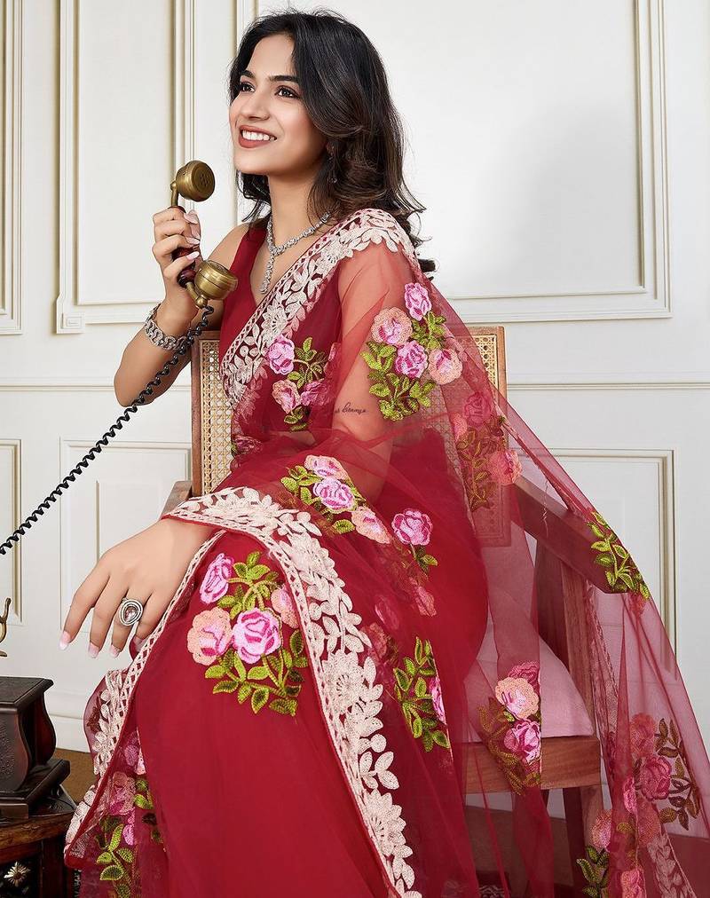 Red embroidered work saree with blouse piece