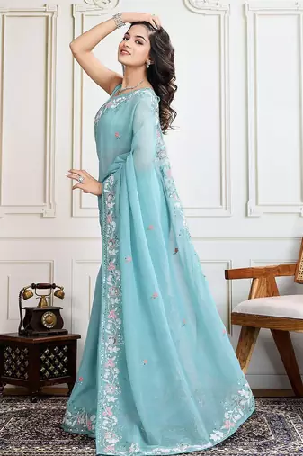 Turquoise embroidered saree with blouse