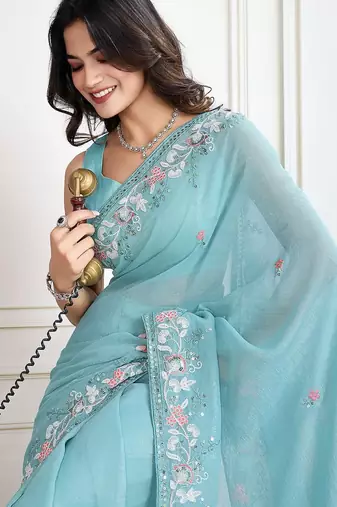 Turquoise embroidered saree with blouse