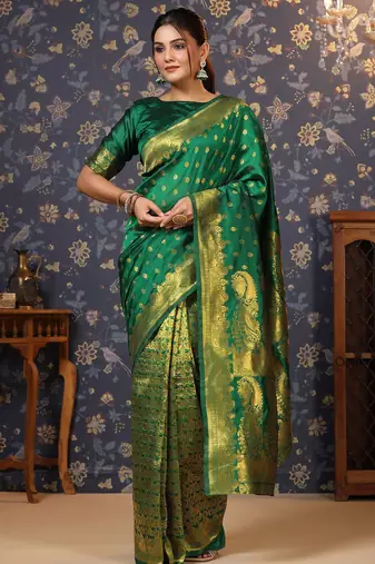 Green ethnic motif woven deisgn zari banarasi saree