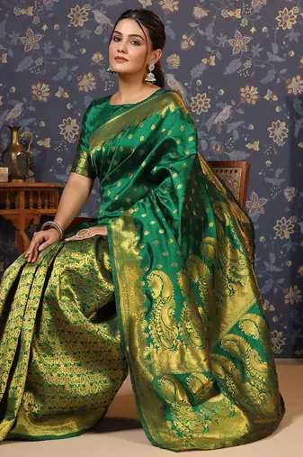 Green ethnic motif woven deisgn zari banarasi saree