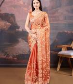 Orange floral embroidered saree