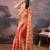 Orange floral embroidered saree