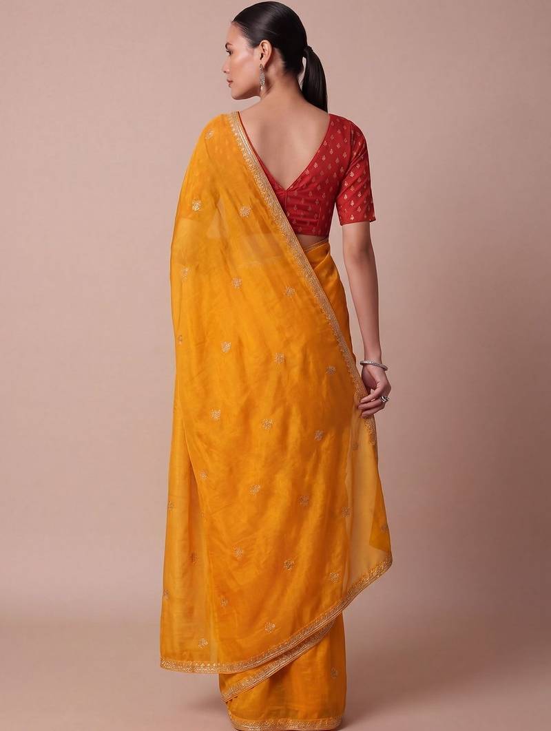Yellow embellished embroidered silk blend saree