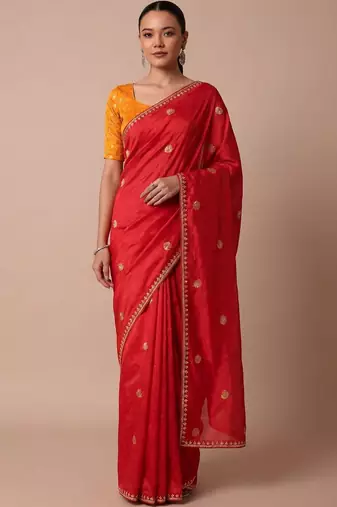 Red embellished zari silk blend saree