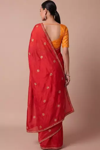Red embellished zari silk blend saree