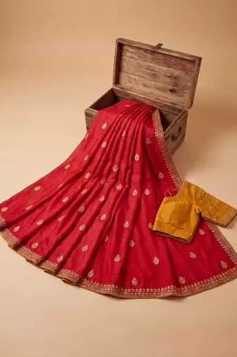 Red embellished zari silk blend saree