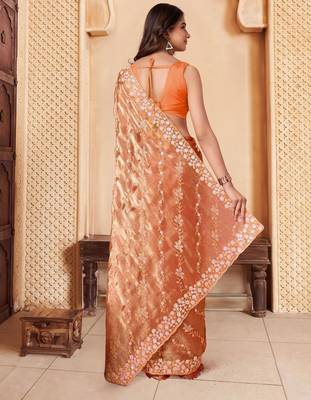 Orange embroidered embellished sarees 4