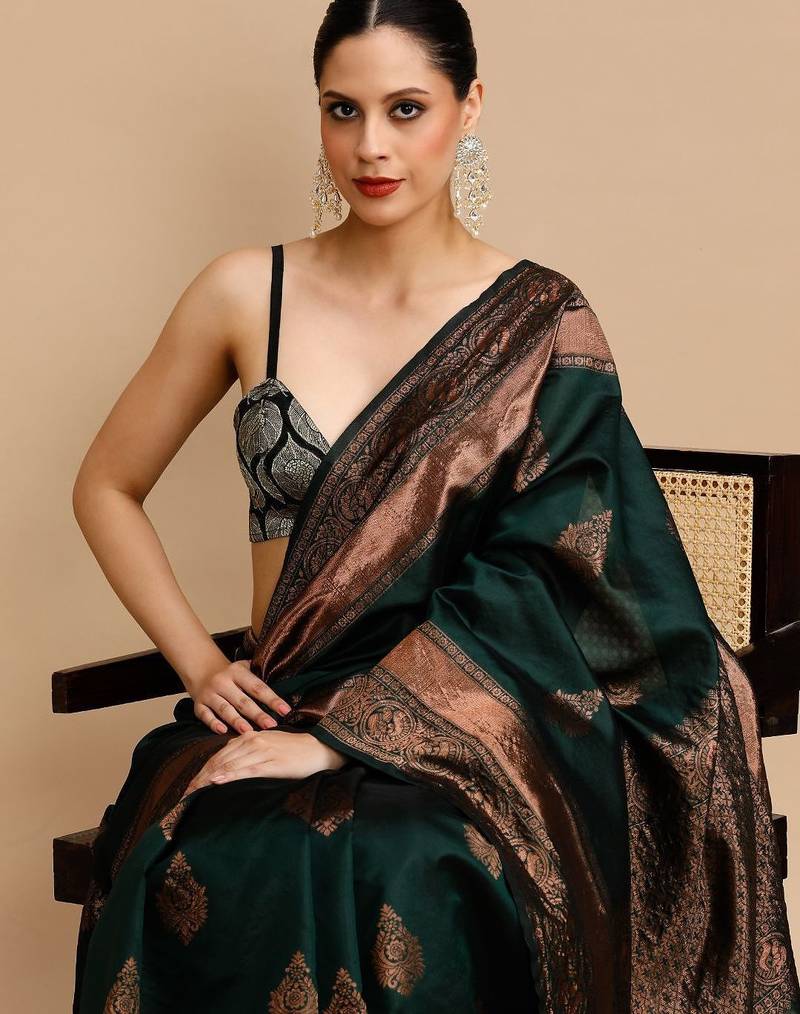 Green woven design banarasi saree with unstitched blouse