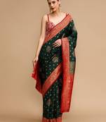 Green ethnic motifs banarasi saree with unstitched blouse