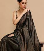 Green banarasi woven design saree with blouse