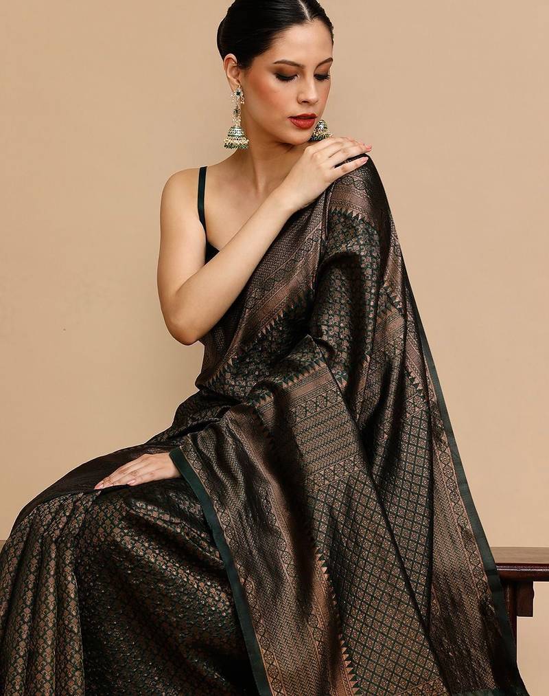 Green banarasi woven design saree with blouse