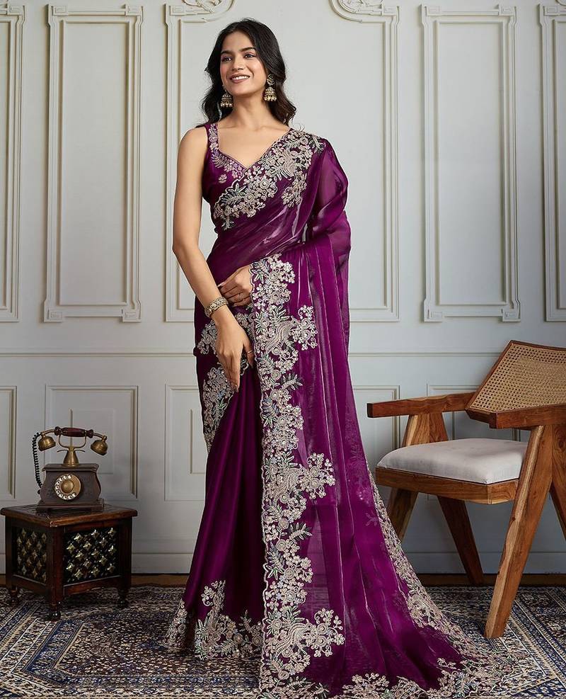 Purple heavy embroidered border saree