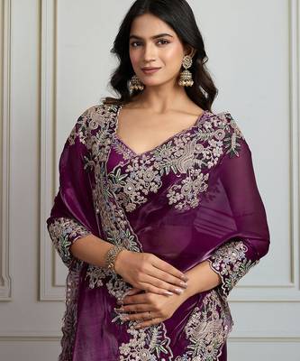 Purple heavy embroidered border saree 5