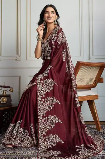 Maroon ethnic motif embroidered saree