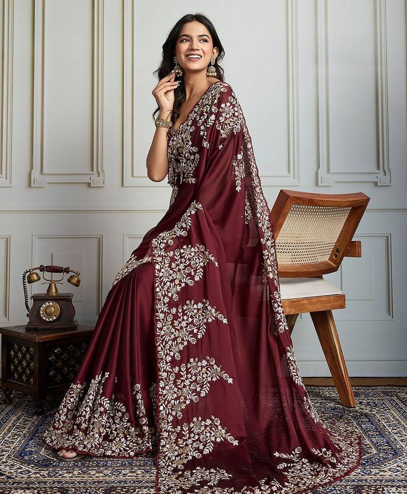 Maroon ethnic motif embroidered saree