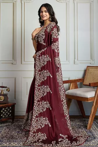 Maroon ethnic motif embroidered saree