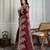 Maroon ethnic motif embroidered saree