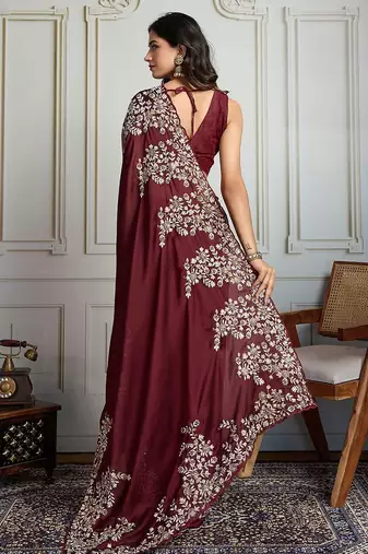 Maroon ethnic motif embroidered saree